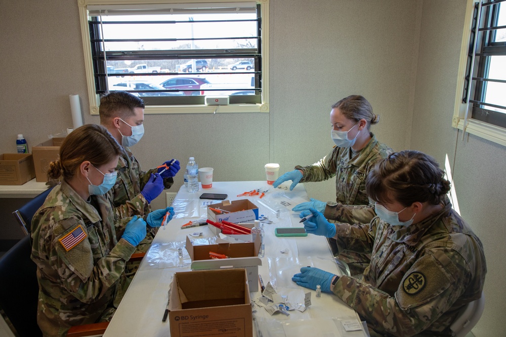 MEDCOM Personnel Prepare Vaccinations for CVC