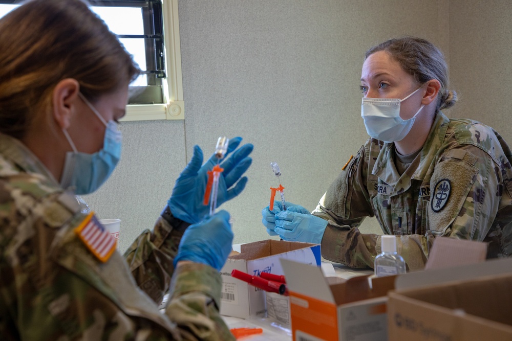 MEDCOM Personnel Prepare Vaccinations for CVC