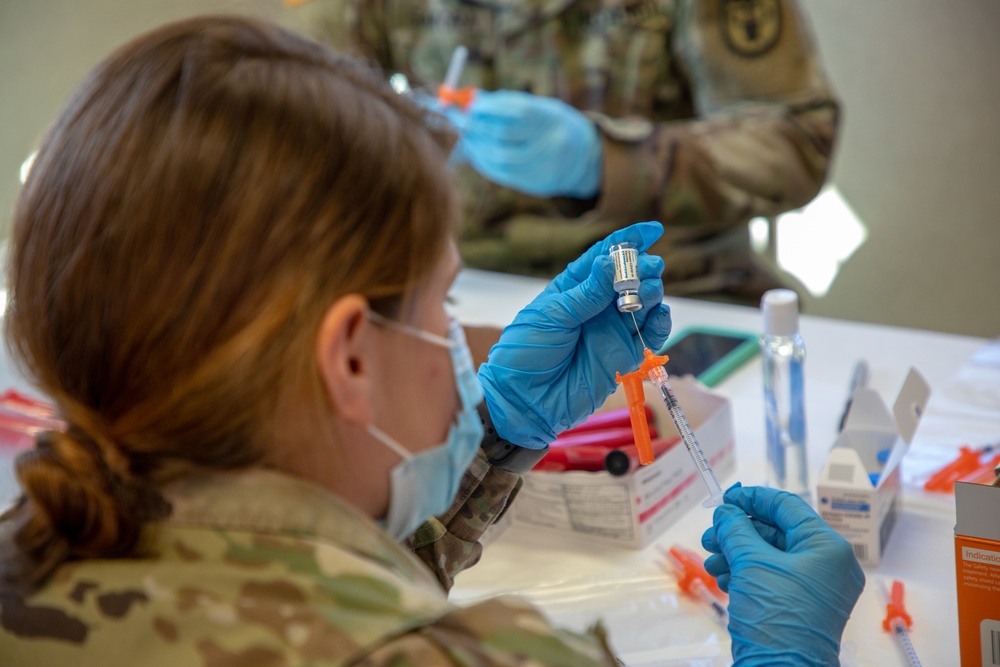 MEDCOM Personnel Prepare Vaccinations for CVC