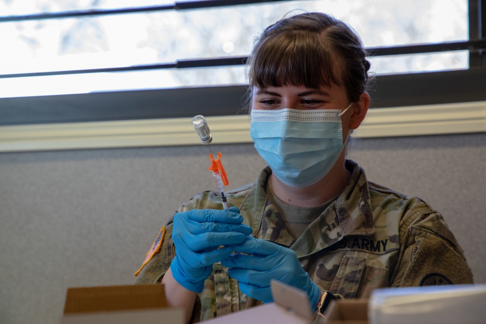 MEDCOM Personnel Prepare Vaccinations for CVC