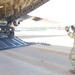 Airman guides Humvee off transport plane during JRTC 21-05