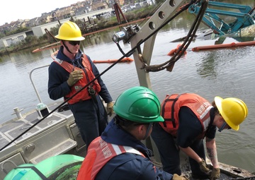 U.S. Coast Guard ANT Relieves Wreckage Buoy