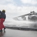 U.S. Navy Sailors with Fleet Logistics Support Squadron (VRC) 30, DET-5, Carrier Air Wing Five (CVW-5) conduct an airfield firefighting exercise