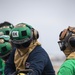 U.S. Navy Sailors with Fleet Logistics Support Squadron (VRC) 30, DET-5, Carrier Air Wing Five (CVW-5) conduct an airfield firefighting exercise