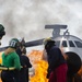 U.S. Navy Sailors with Fleet Logistics Support Squadron (VRC) 30, DET-5, Carrier Air Wing Five (CVW-5) conduct an airfield firefighting exercise
