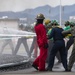 U.S. Navy Sailors with Fleet Logistics Support Squadron (VRC) 30, DET-5, Carrier Air Wing Five (CVW-5) conduct an airfield firefighting exercise