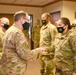 U.S. Army Major General Paul D. Rogers, adjutant general of the Michigan Presents Challenge Coin