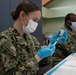 U.S. Service members inoculate community members on the opening day of the CVC in Paterson, NJ