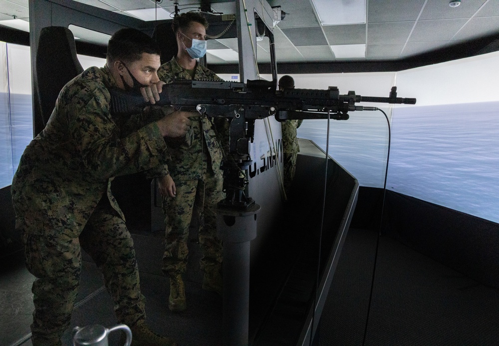 Marines receive Crew Served Weapons training from Maritime Expeditionary Security Group (MESG) 1 Training Evaluation Unit