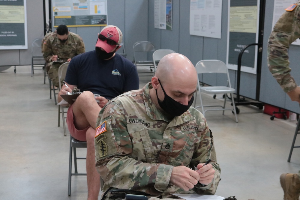 1st TheaterSustainment Command Soldier's receive the Covid-19 vaccine