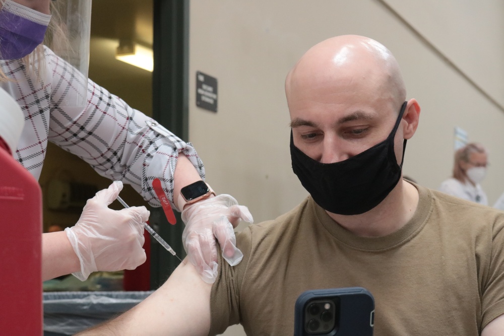 1st Theater Sustainment Command Soldier's receive the Covid-19 vaccine