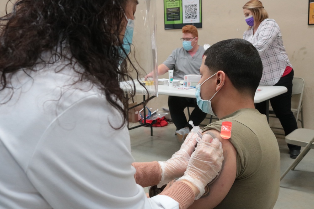 1st Theater Sustainment Command Soldier's receive the Covid-19 vaccine