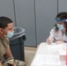 1st Theater Sustainment Command Soldier's receive the Covid-19 vaccine