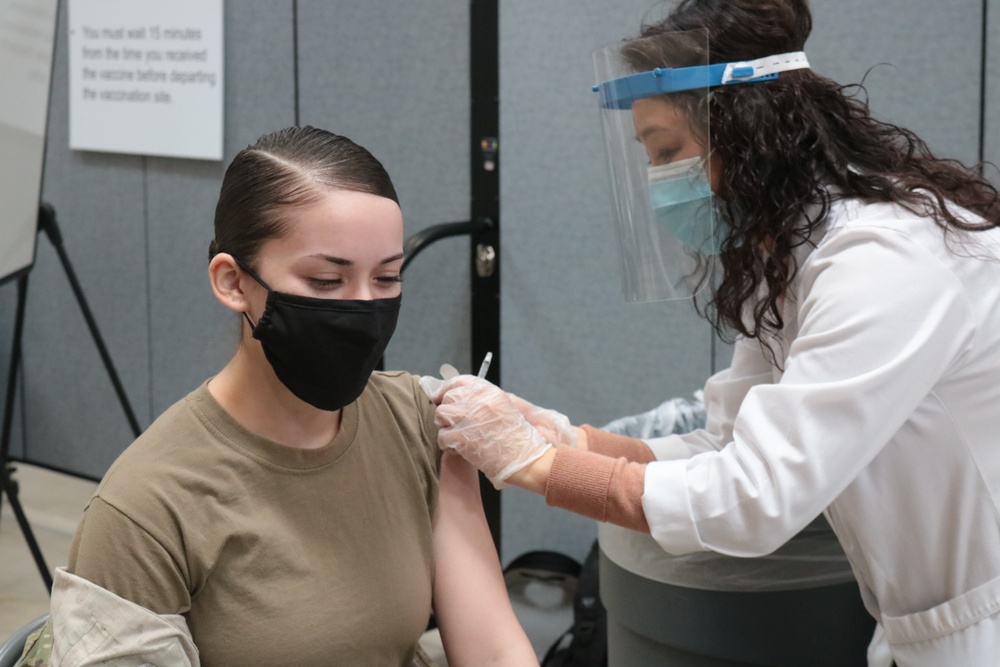 1st Theater Sustainment Command Soldier's receive the Covid-19 vaccine
