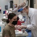1st Theater Sustainment Command Soldier's receive the Covid-19 vaccine