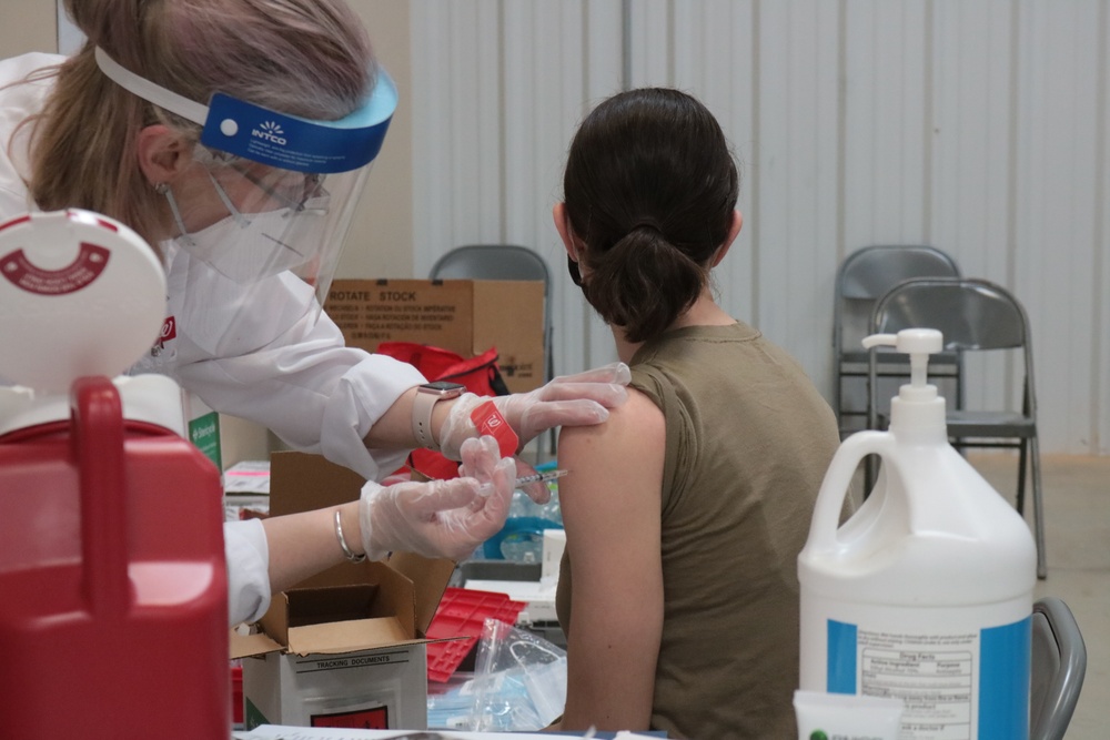 1st Theater Sustainment Command Soldier's receive the Covid-19 vaccine