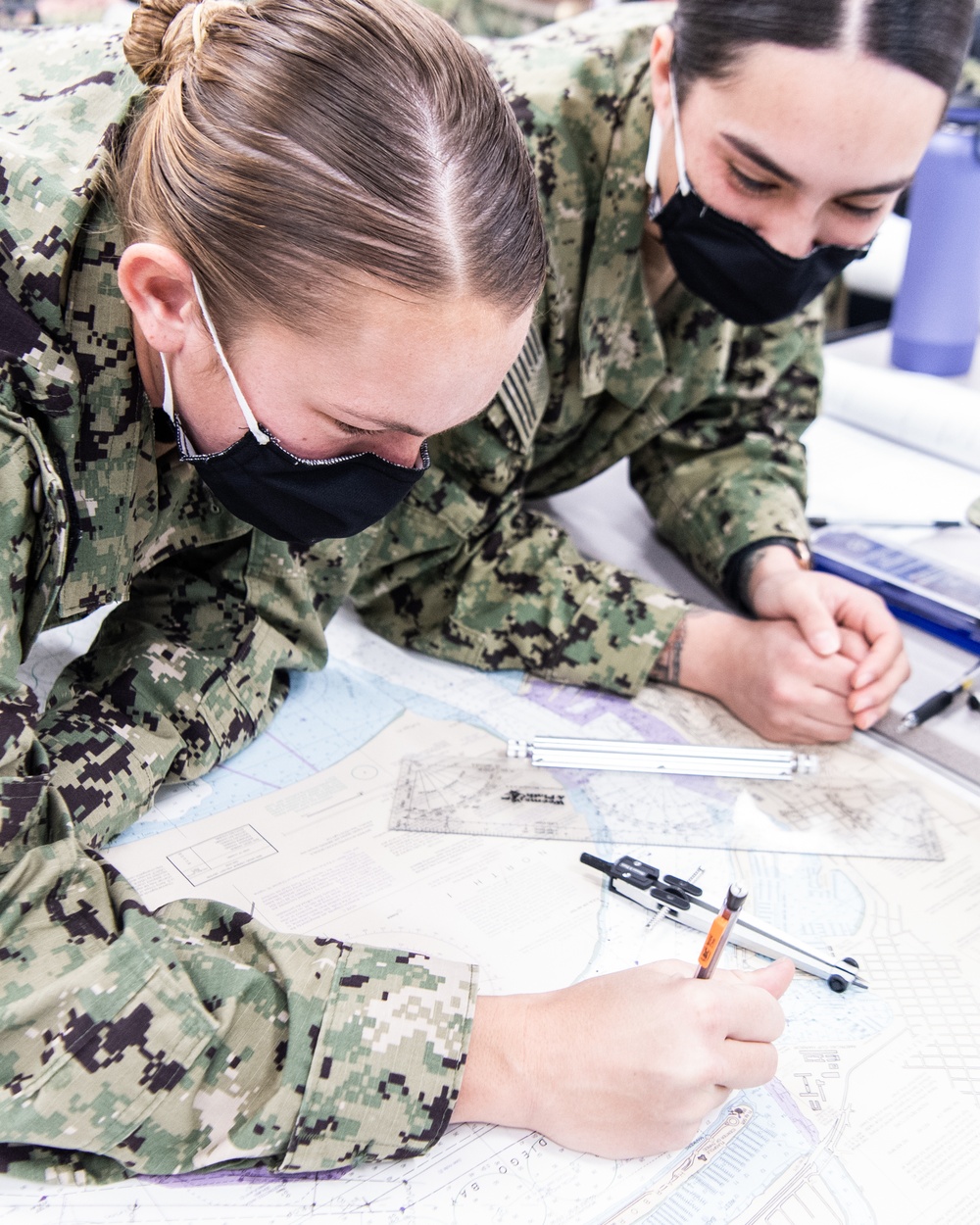 210311-N-TE695-0002 NEWPORT, R.I. (March 11, 2021) STA-21 students learn ship navigation