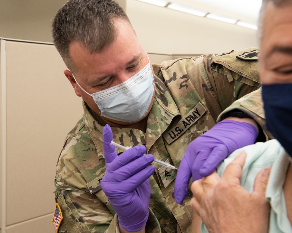 SCNG medics vaccinate Soldiers, eliglble veterans