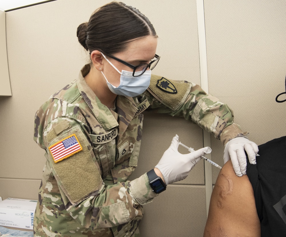 SCNG medics vaccinate Soldiers, eliglble veterans