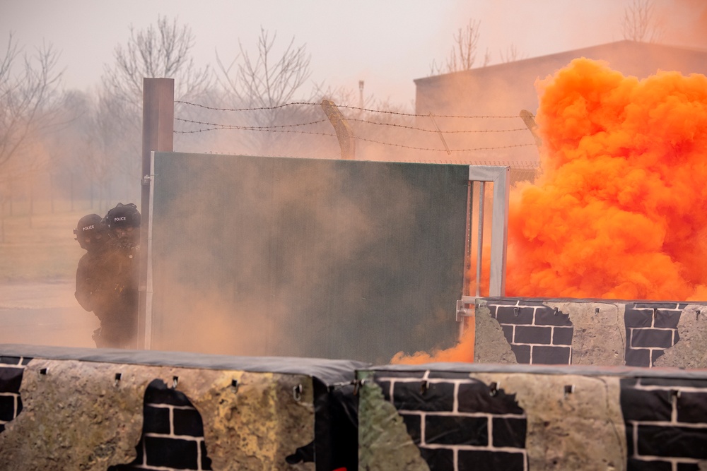 422nd SFS, NHPD strengthen local ties through live-fire, field training exercises