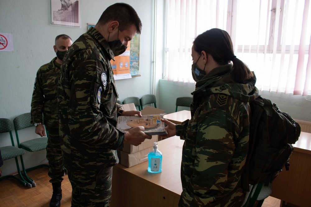 Greek KFOR LMT meets with school