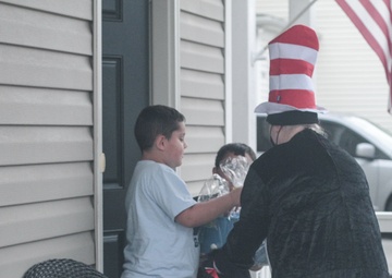 Read Across America: Prize Patrol Team delivers book gift baskets to 16 students