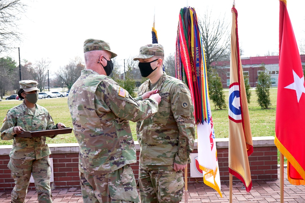 Sgt. Anthony Escobedo receives the meritorious service medal