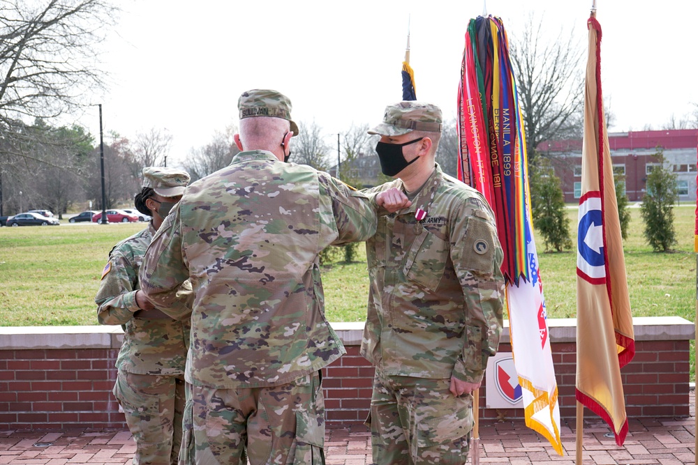 Sgt. Anthony Escobedo receives the meritorious service medal