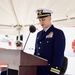 Commanding officer USCGC Robert Goldman reads his orders