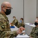 Service members in-process for new COVID Community Vaccination Centers