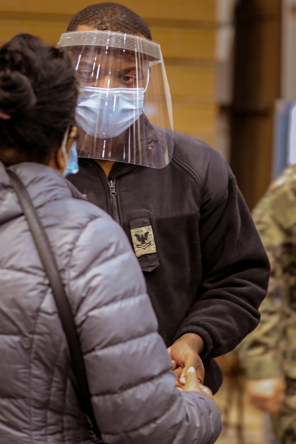 U.S. Navy Sailors conduct COVID-19 vaccinations at York College