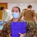 U.S. Navy Sailors conduct COVID-19 vaccinations at York College