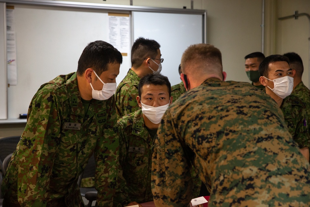 Col. Masahiro Yamashita, commanding officer, 51st Regiment, Japan Ground Self-Defense Force, meets with key leaders with 4th Marine Regiment