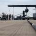 352d Special Operations Wing assist in repairing air-to-air refueling equipment on an Armée de l'Air et de l’Espace (French Air and Space Force) KC-130J