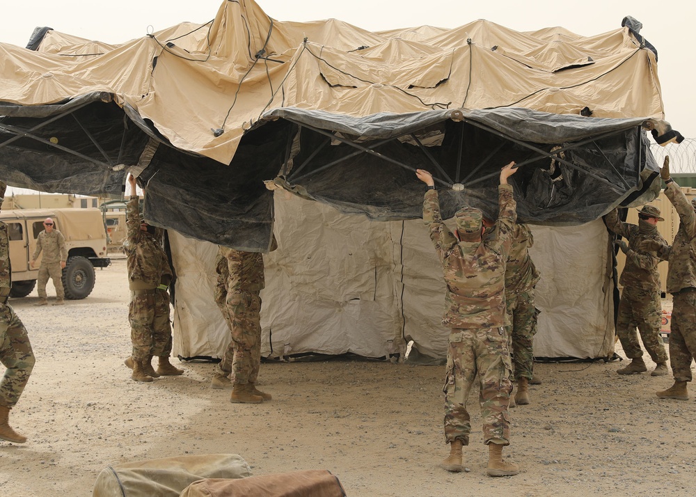 Army Reserve Soldiers deployed to Camp Arifjan set up Early Entry Command Post