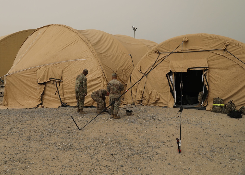 Army Reserve Soldiers deployed to Camp Arifjan set up Early Entry Command Post