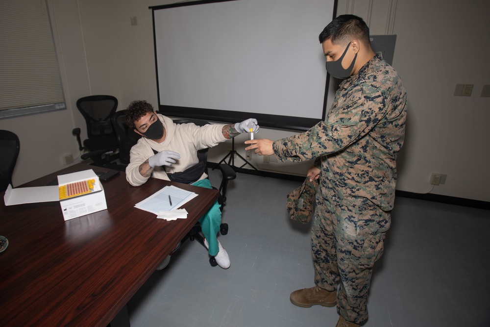 MRF-D Advanced Echelon receive a COVID-19 test