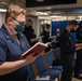 Sailors take part in religious services