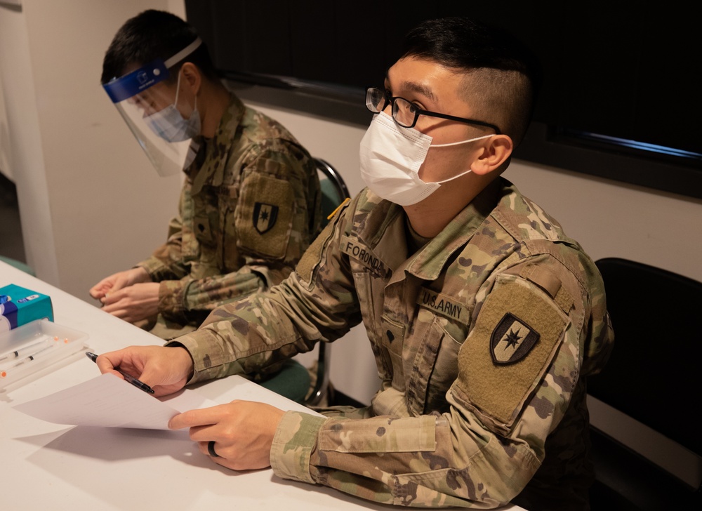 U.S. Army Soldiers give community members their second dose of the COVID-19 vaccine in Somerset, NJ