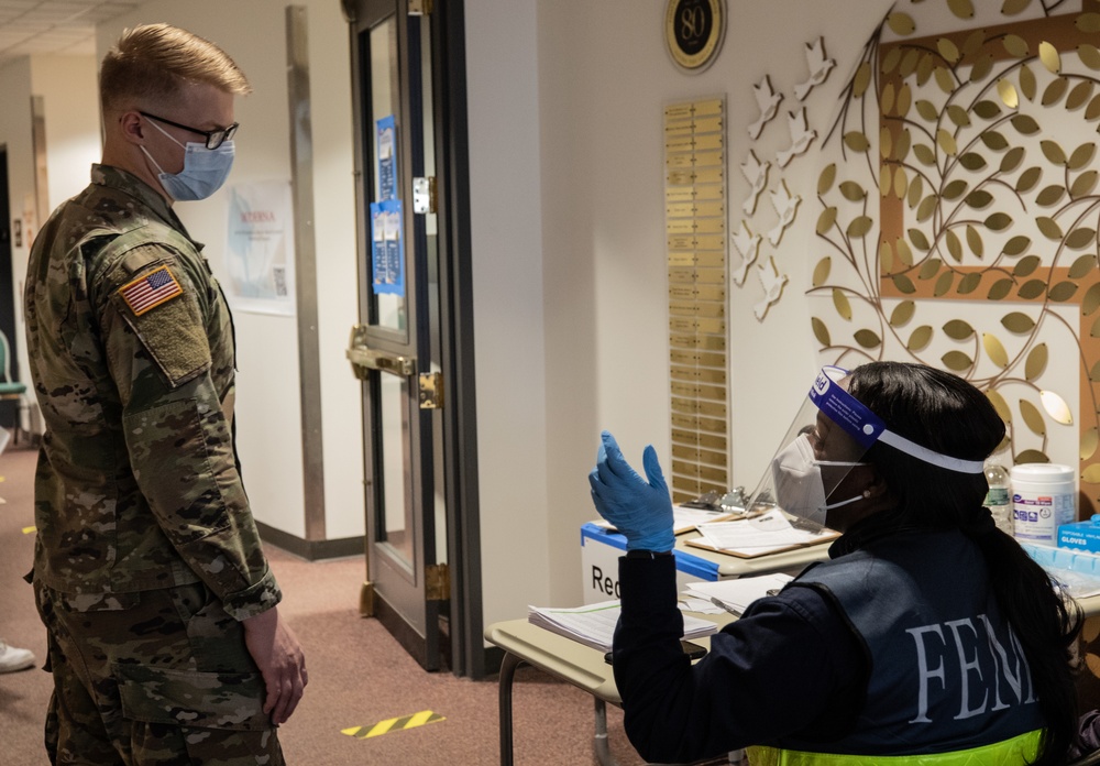 U.S. Army Soldiers give community members their second dose of the COVID-19 vaccine in Somerset, NJ