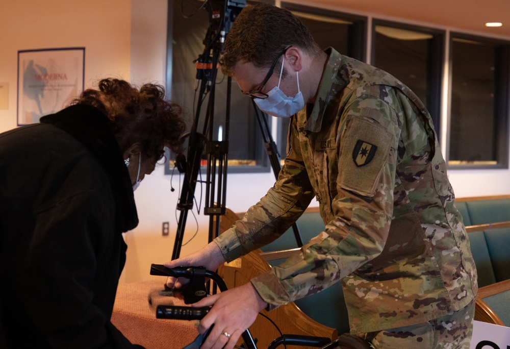 U.S. Army Soldiers give community members their second dose of the COVID-19 vaccine in Somerset, NJ