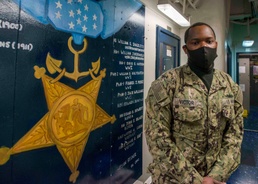 Miami native serving on USS Ronald Reagan receives COVID-19 vaccine