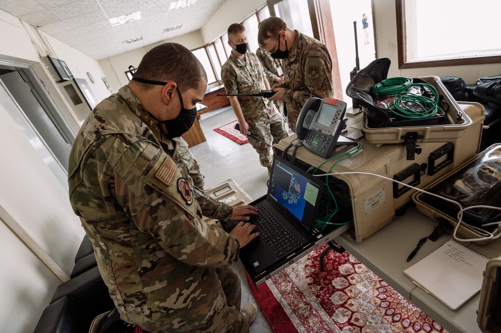 AUAB Airmen employ communication flyaway kits at Doha Air Base, Qatar