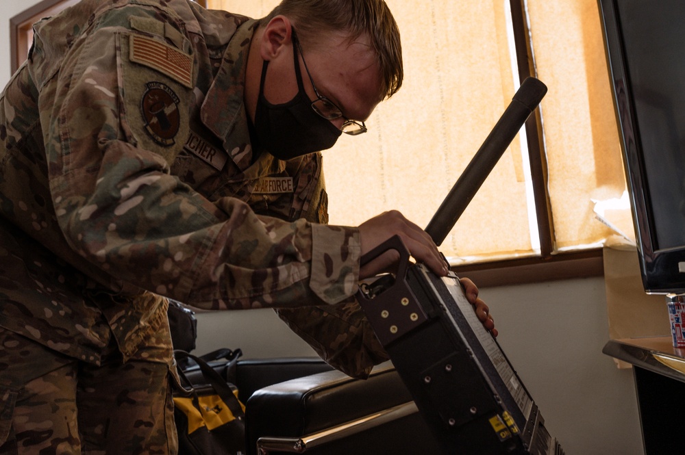 AUAB Airmen employ communication flyaway kits at Doha Air Base, Qatar