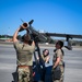 South Dakota Air Guardsmen load munitions on F-16s