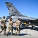 South Dakota Air Guardsmen load munitions on F-16s