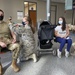 Nebraska National Guard family members receive doses of a COVID-19 vaccine