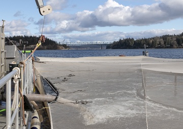 NUWC Keyport, Suquamish Tribe release salmon at Keyport pier