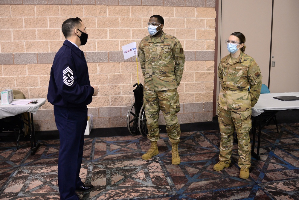 NJ State Command Chief Master Sgt. Michael Rakauckas visits with NJ Airmen supporting the COVID-19 Atlantic County Vaccination Mega-Site in Atlantic City, N.J.