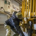 Sailor prepares a forklift